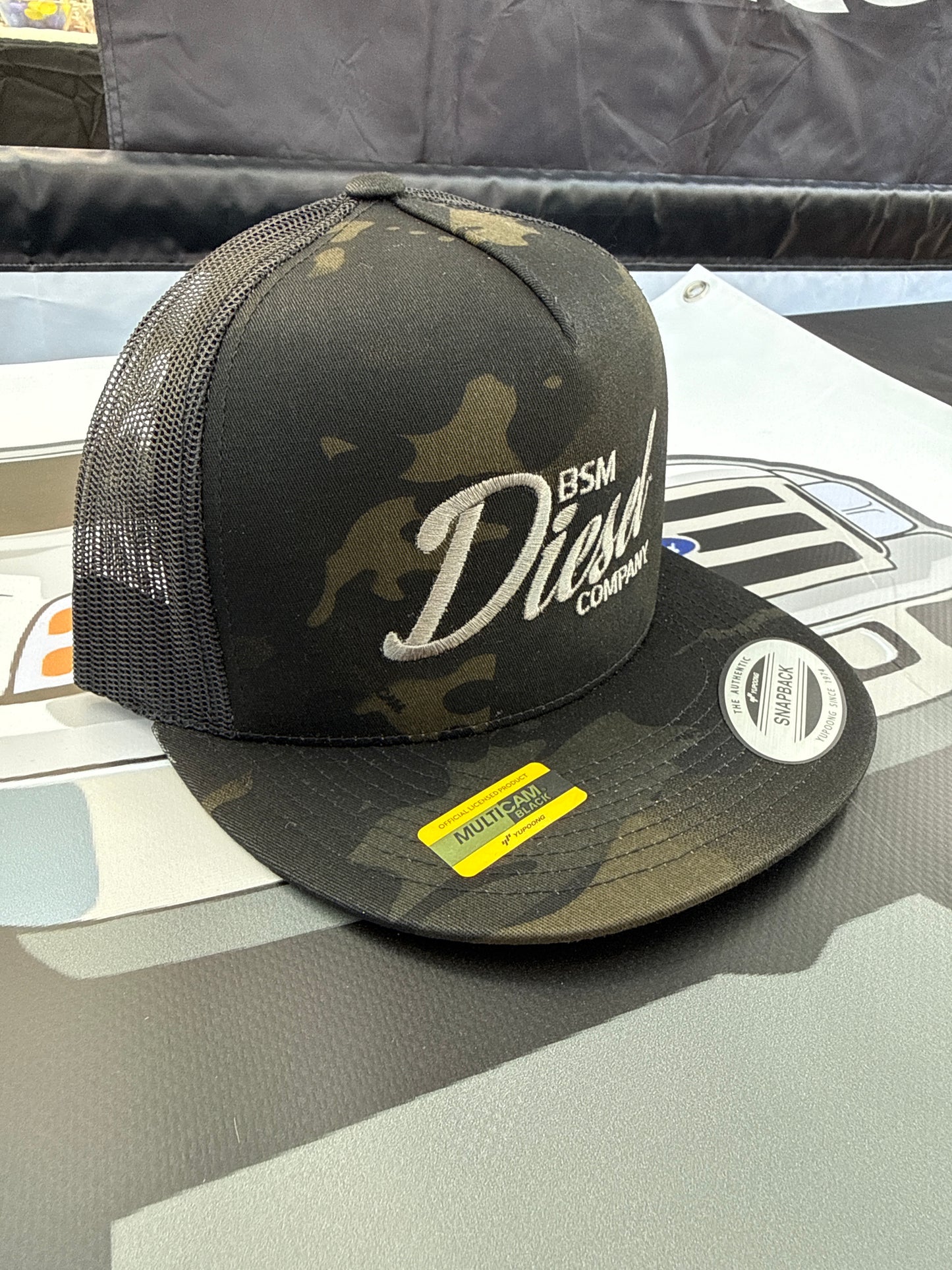 Cursive Logo Trucker Hat